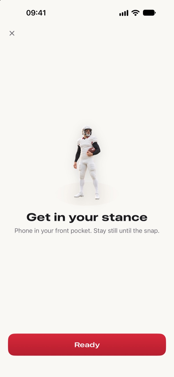 Get in your stance: a line drawing of a player in a three-point stance with the phone in a front pocket.